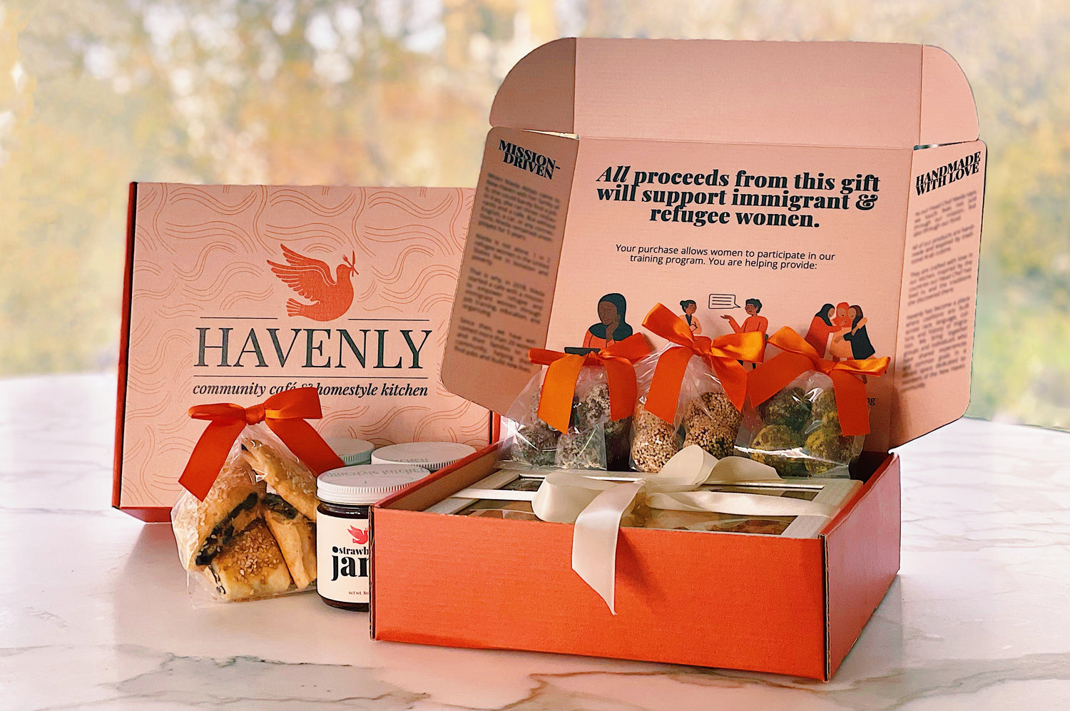 The Havenly Gift Box, which features jam, cookies, and other products made in New Haven at Havenly. All proceeds support immigrant and refugee women in our community.